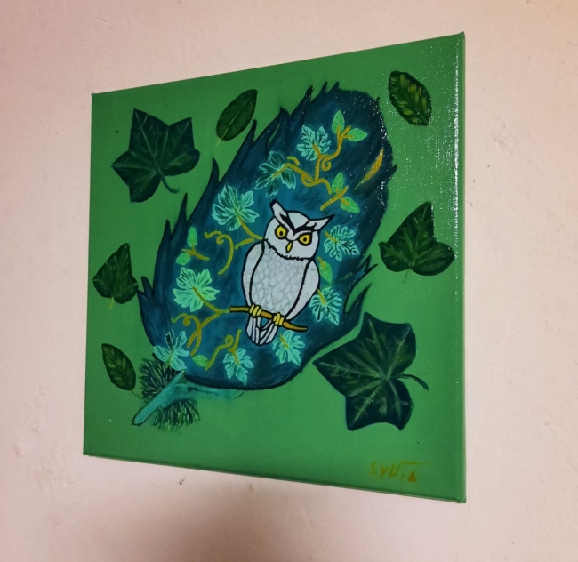 Hibou et ses feuilles sacrées